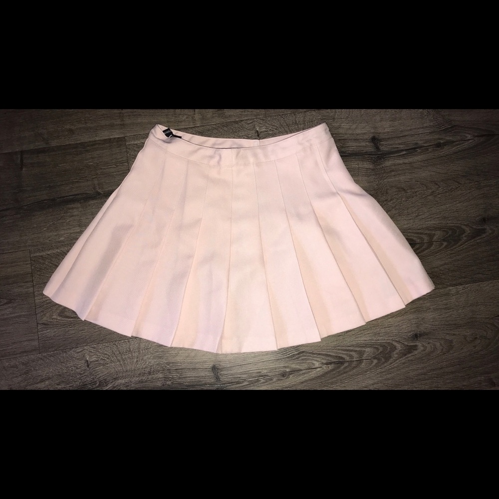 Pale pink pleated skirt